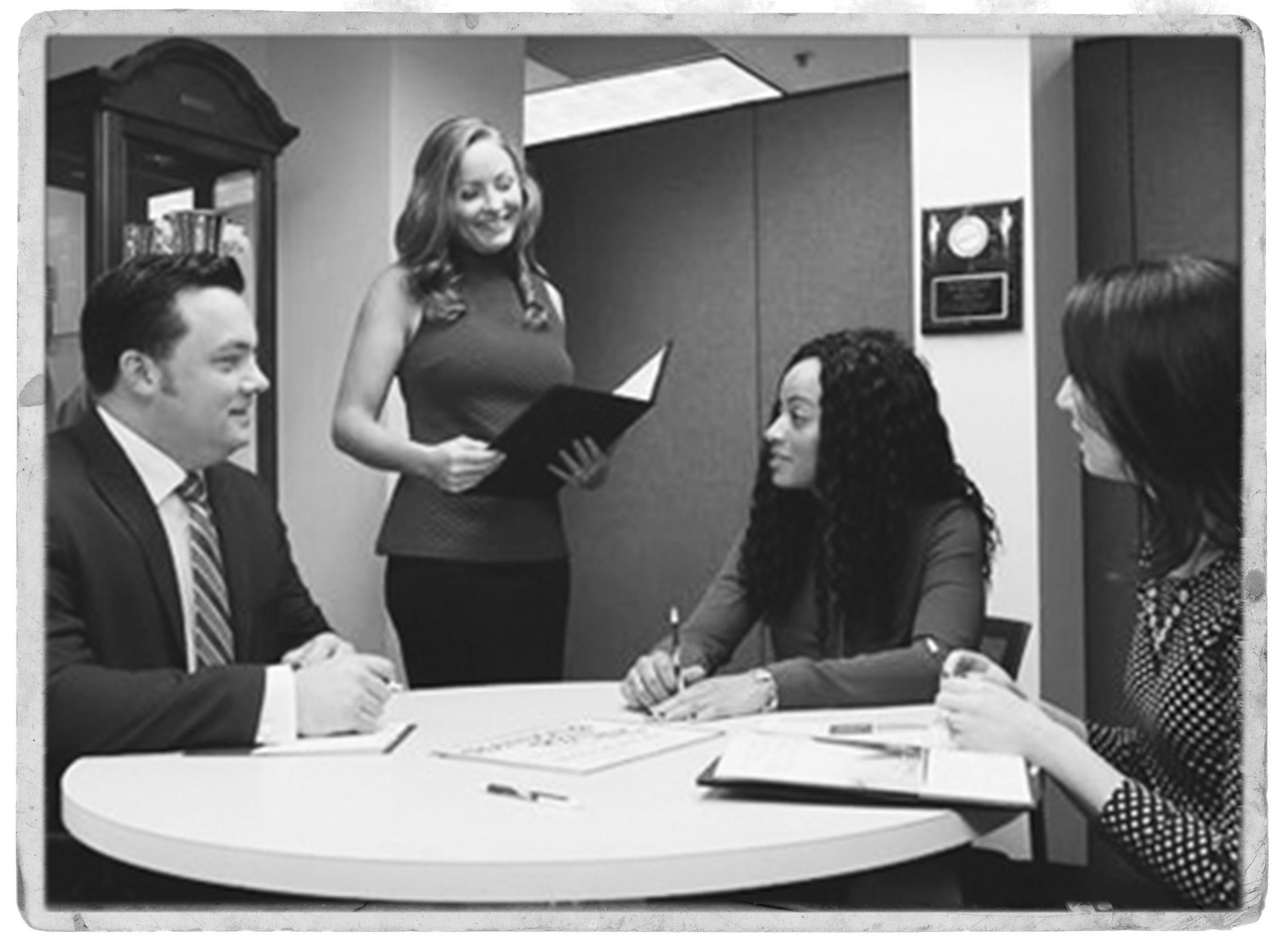 Group in office in black and white