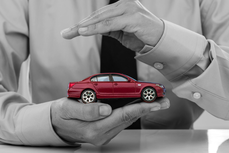 Man Holding toy car